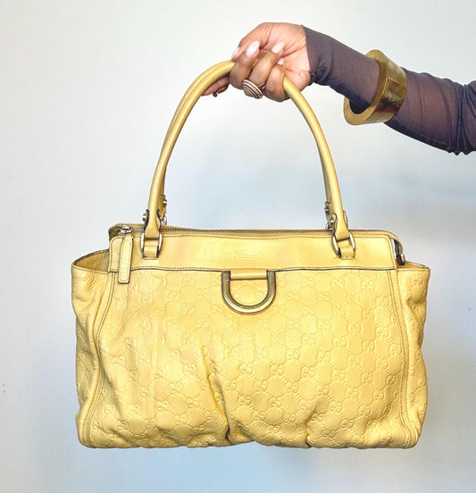 Vintage Y2K Gucci Guccissima Logo Embossed Leather Hand Bag.