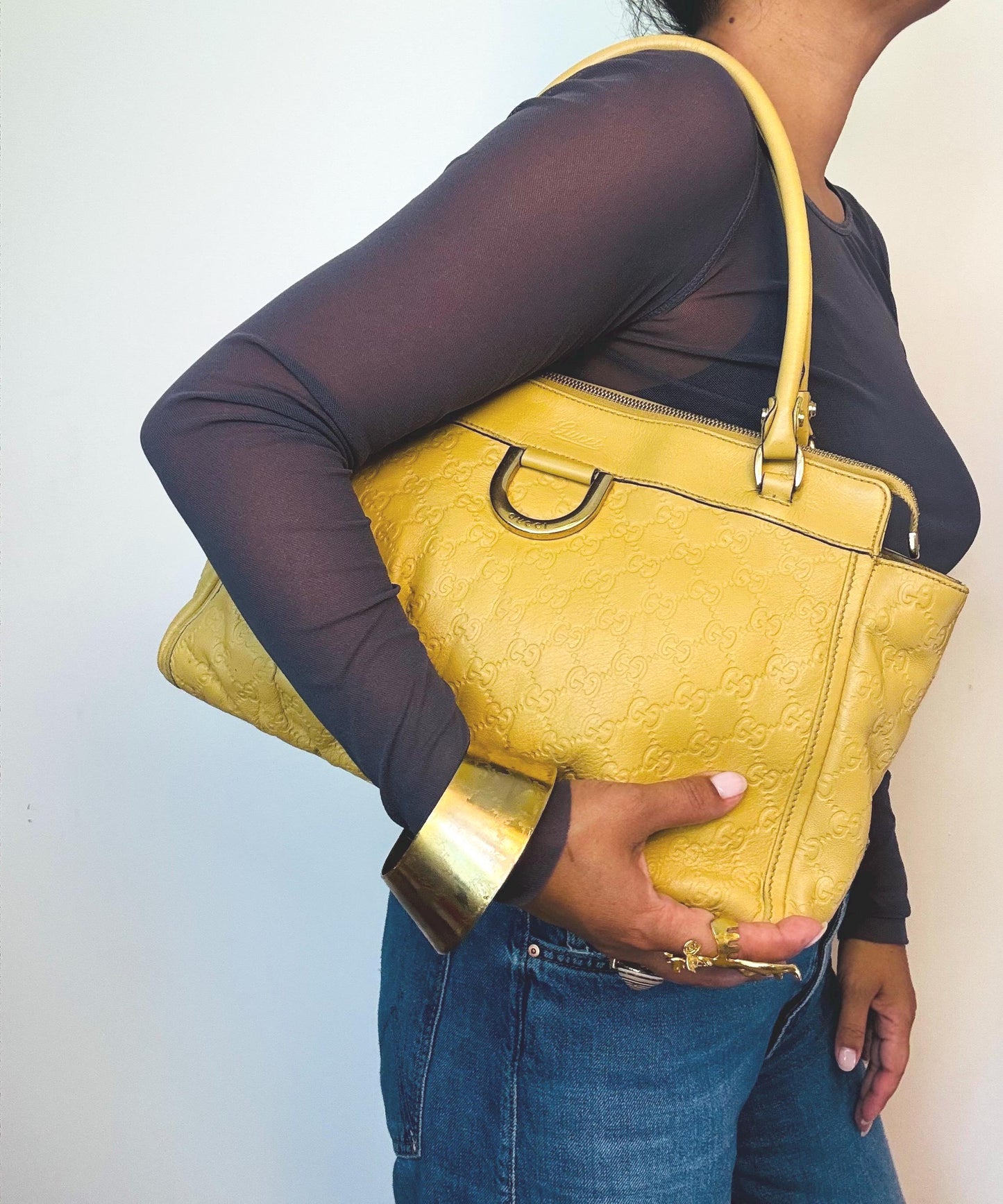 Vintage Y2K Gucci Guccissima Logo Embossed Leather Hand Bag.