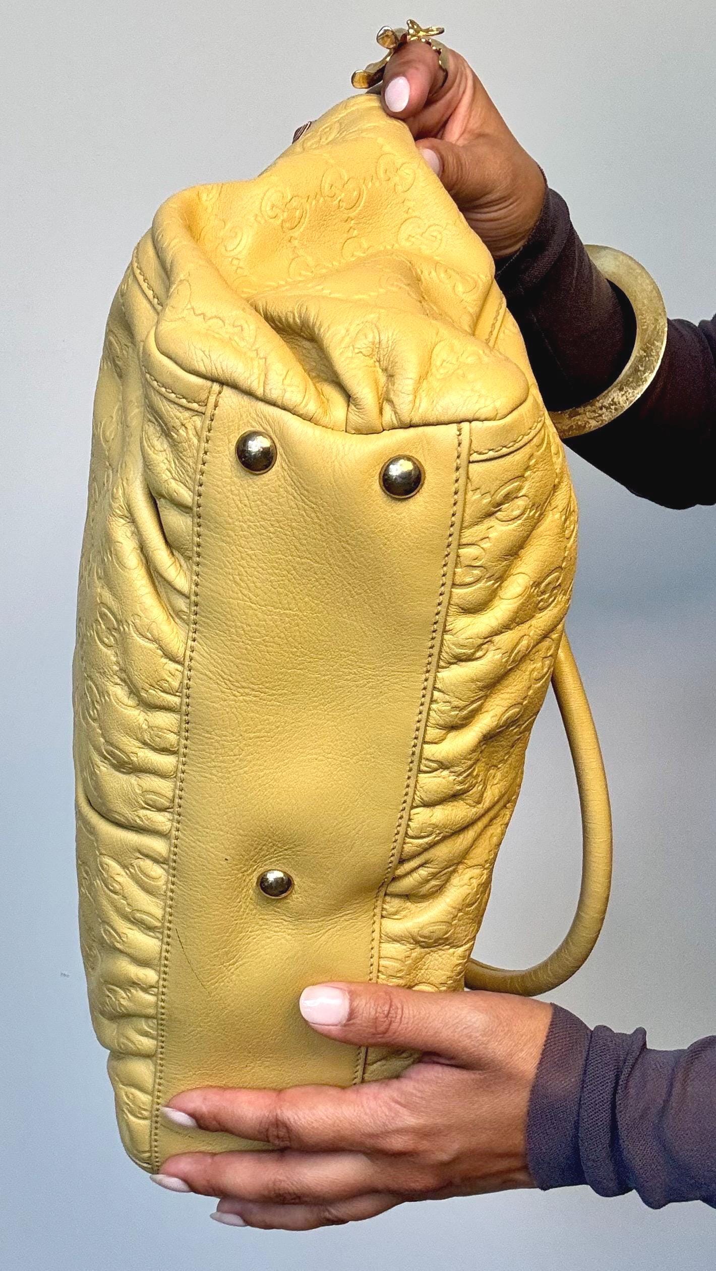 Vintage Y2K Gucci Guccissima Logo Embossed Leather Hand Bag.