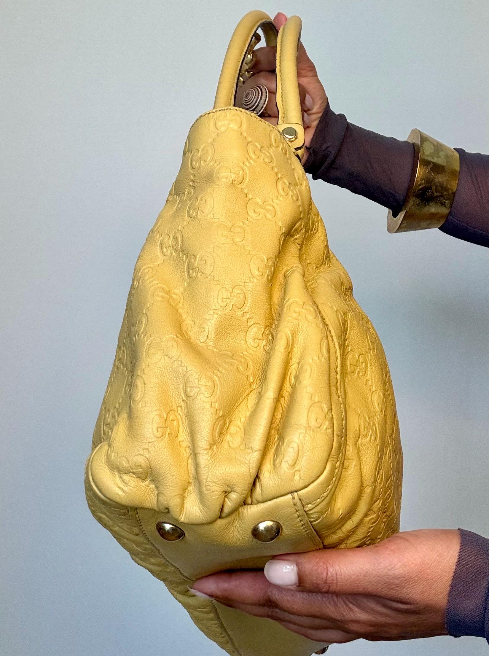 Vintage Y2K Gucci Guccissima Logo Embossed Leather Hand Bag.