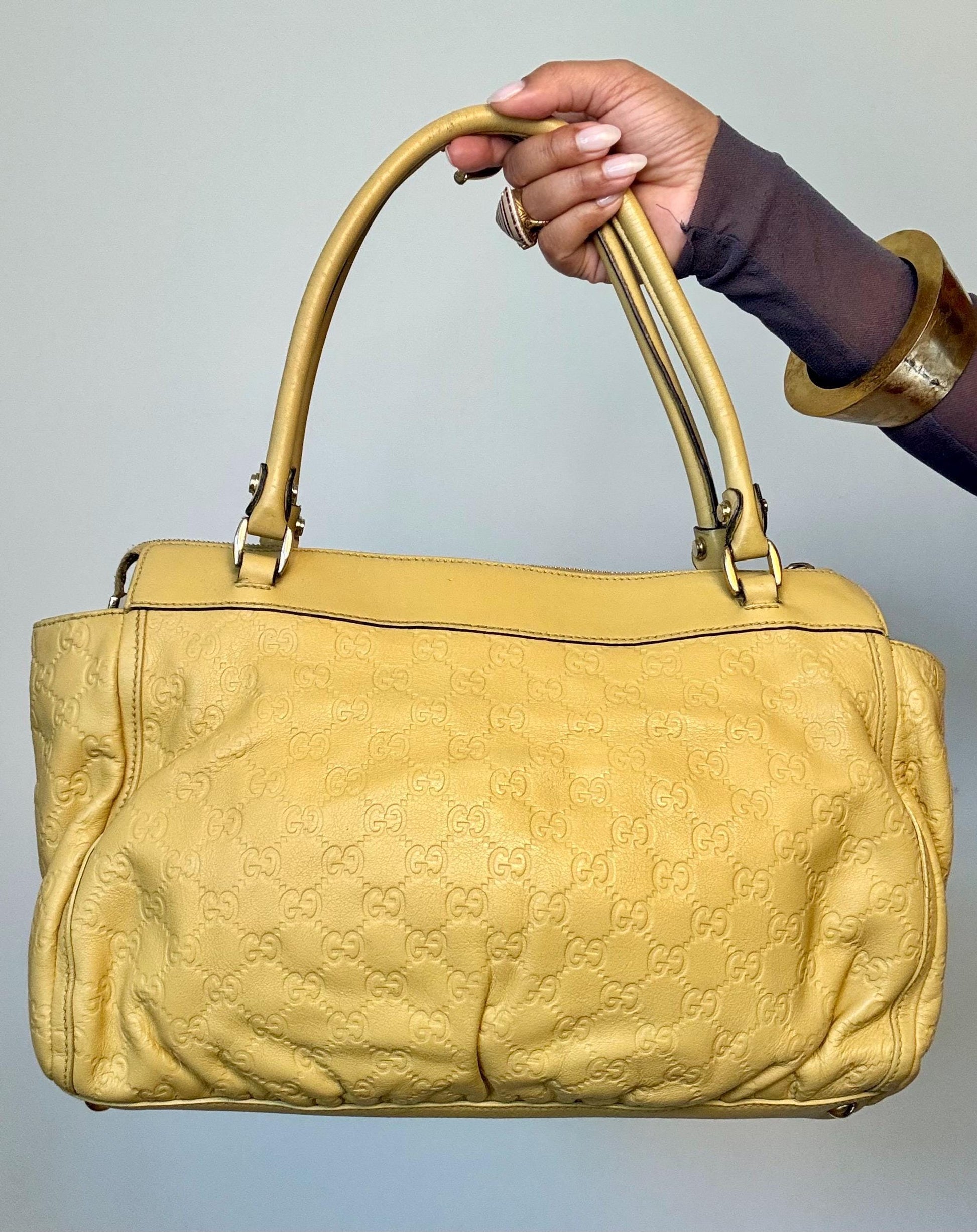 Vintage Y2K Gucci Guccissima Logo Embossed Leather Hand Bag.
