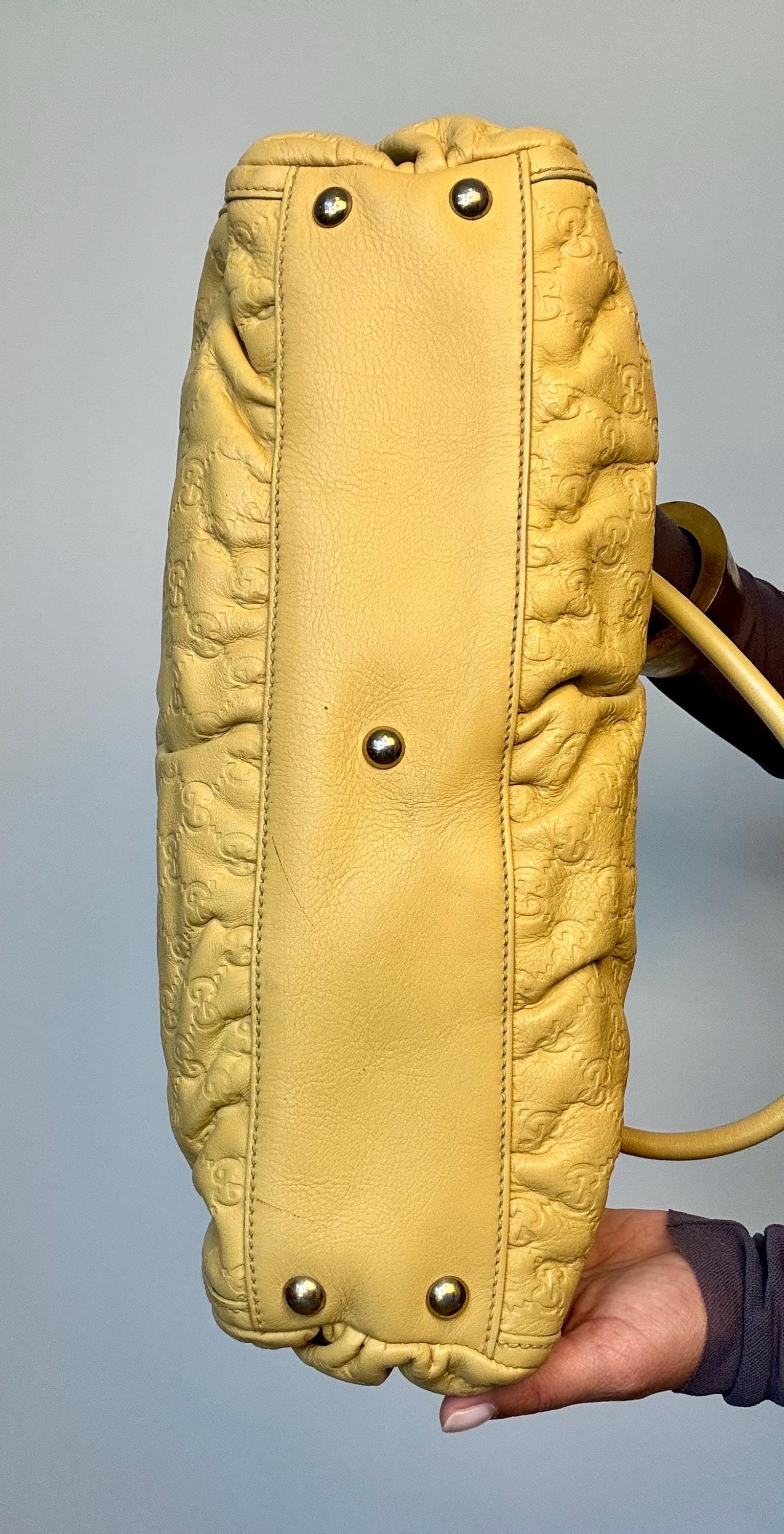 Vintage Y2K Gucci Guccissima Logo Embossed Leather Hand Bag.