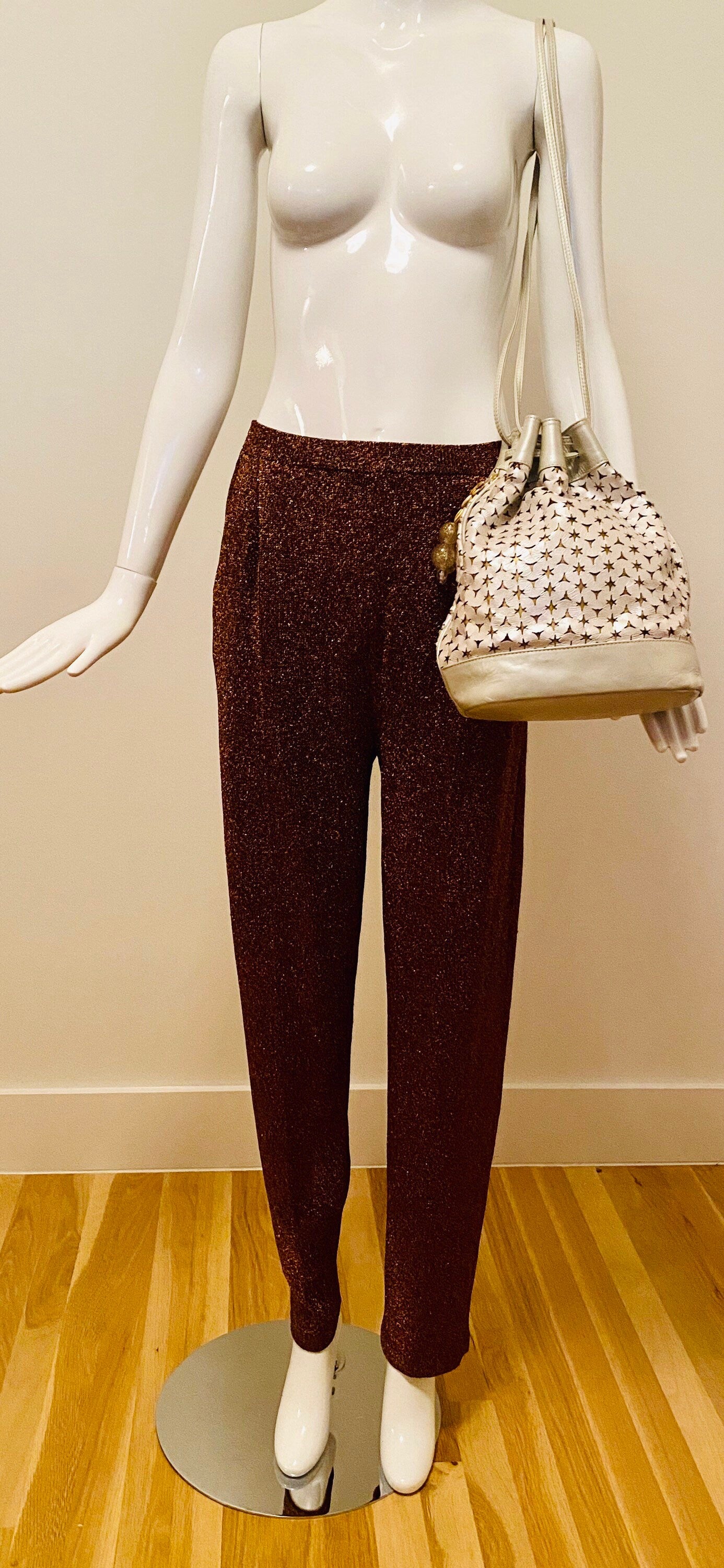 Neiman Marcus 80s Italian Metallic Gold and Pearl Leather Disco Star Perforated Tassels Drawstring Bucket Bag