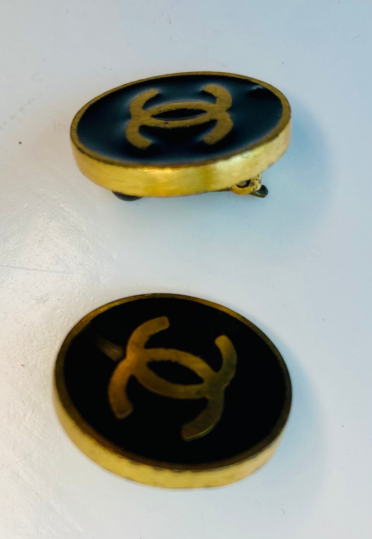 Chanel 2001 Spring Black Enameled and Gold Logo Clip Ons