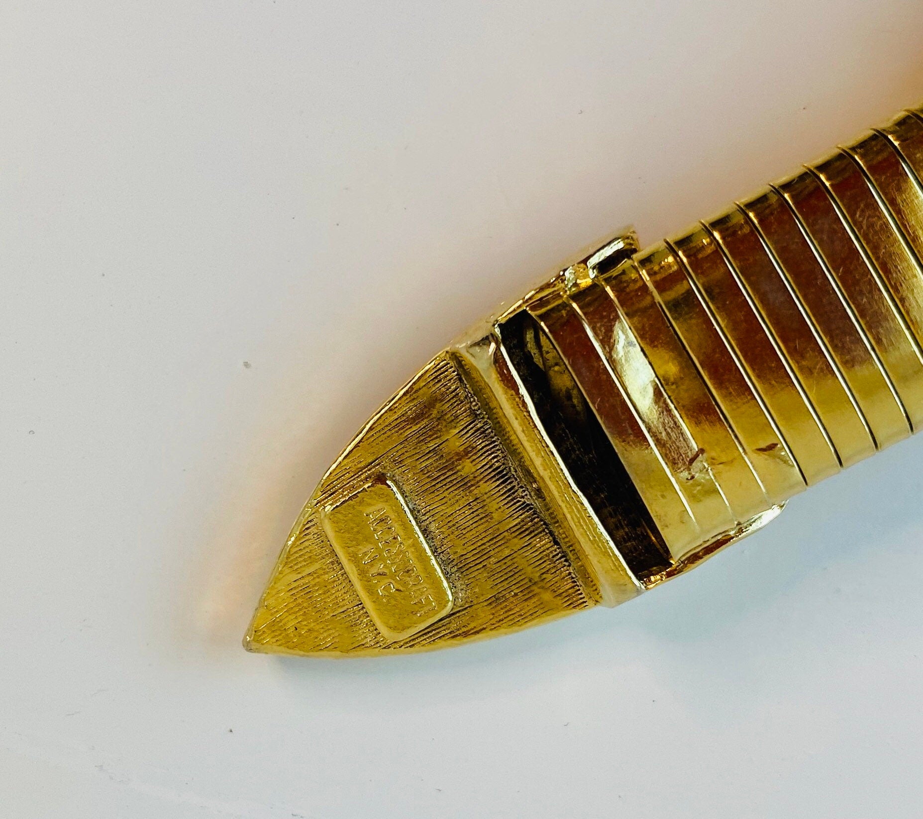 Vintage signed Accessocraft NYC gold stretchy snake chain western metal buckle belt.