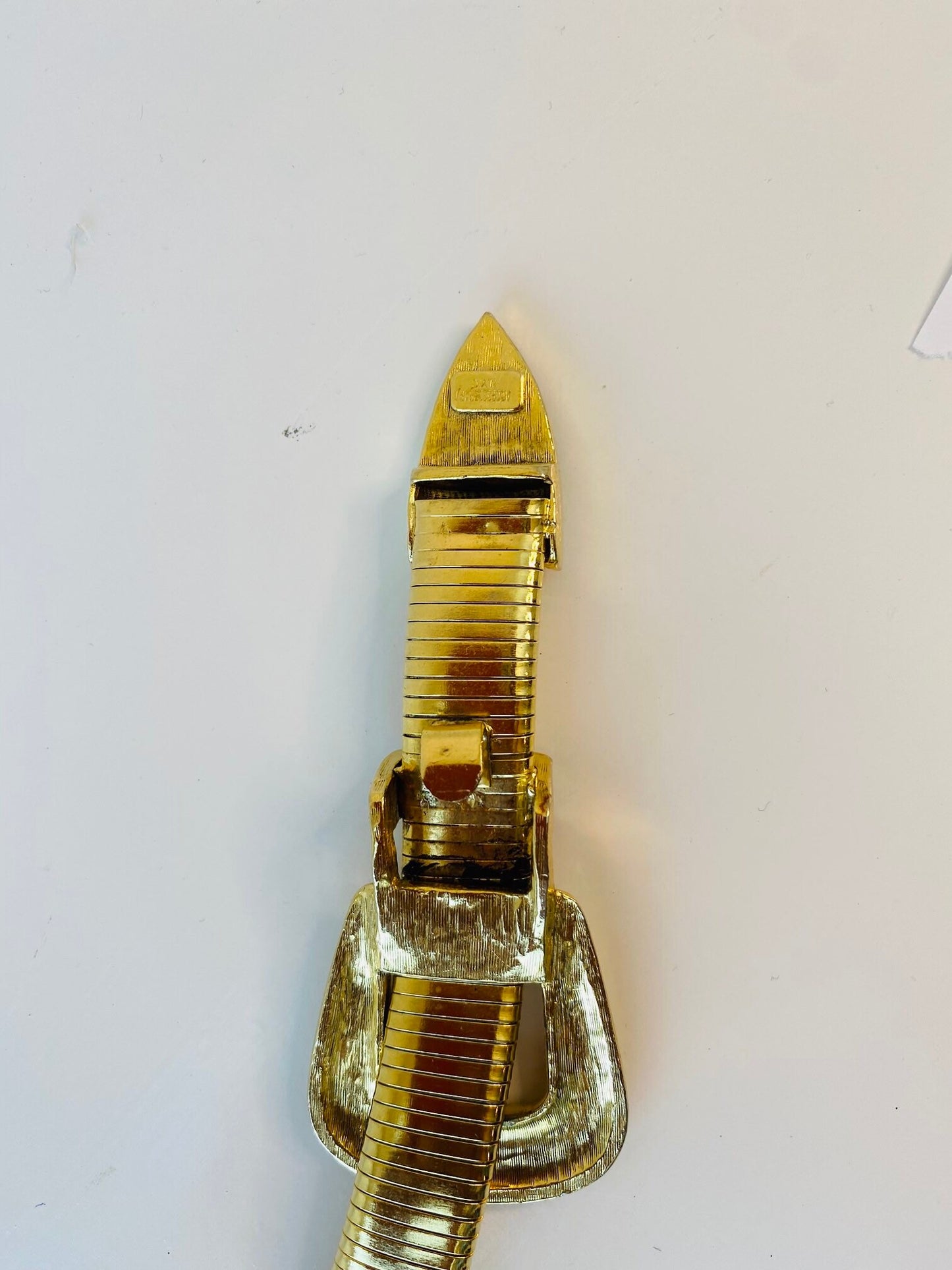 Vintage signed Accessocraft NYC gold stretchy snake chain western metal buckle belt.