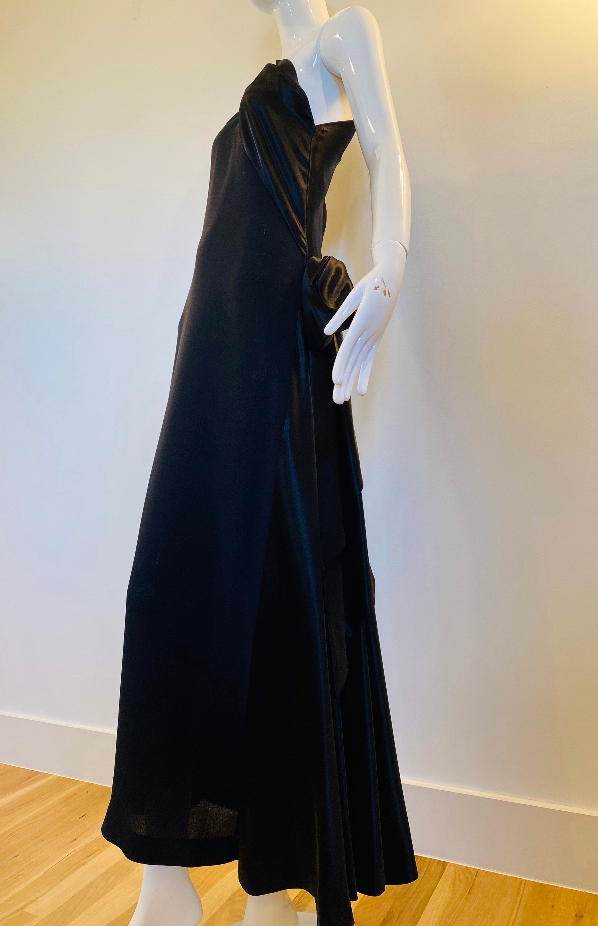Late 70s Mollie Parnis Black One Shoulder Satin and Crepe Side Bow Big Sweep Gown Black Tie